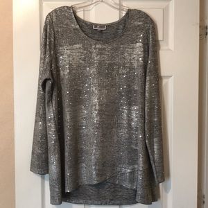 Size Large top in silver with metallic shimmer